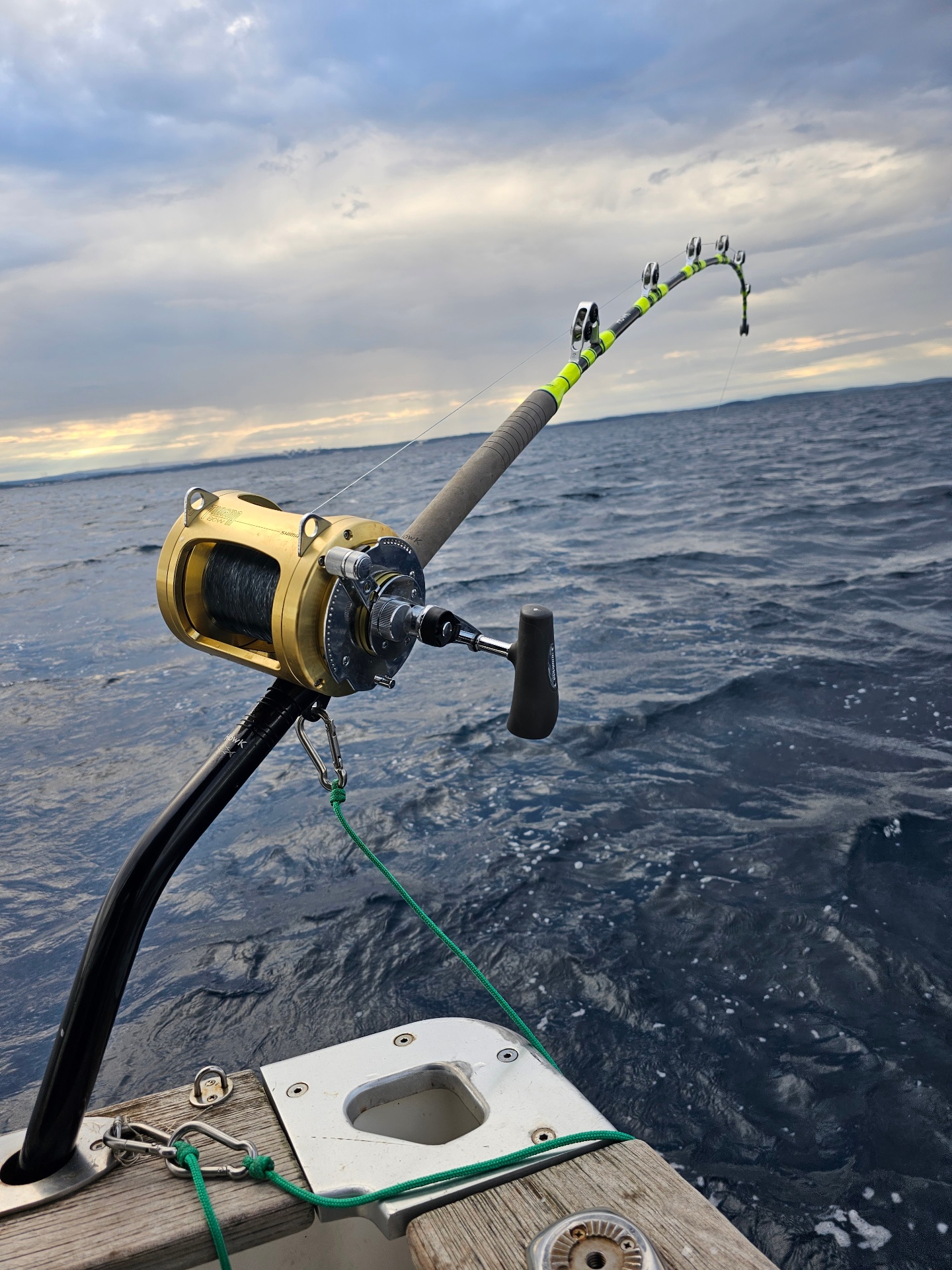 Bent rod under the strain of a bluefin tuna offshore Istria